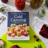 Cold Canning book on counter with jars